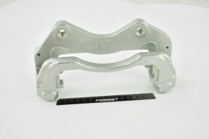 Скоба суппорта передн левая MITSUBISHI PAJERO II, SPORT 0477C-K94WFL 0477C-K94WFL FEBEST