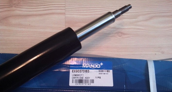 Амортизатор DAEWOO Nexia CHEVROLET Lanos передний левый/правый масляный MANDO EX90373163 MANDO