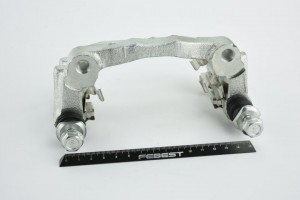 Скоба суппорта задн левая FORD TRANSIT TT9 2006-2013 2177C-TT9RL 2177C-TT9RL FEBEST