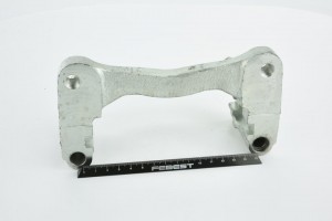 Скоба суппорта передн левая MITSUBISHI PAJERO IV 0477C-NA4WFL 0477C-NA4WFL FEBEST